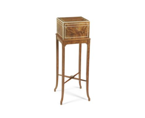 An Edwardian satinwood and ivory line-inlaid portable dressing table or necessaire on stand by Callow of Mount Streetthe inte