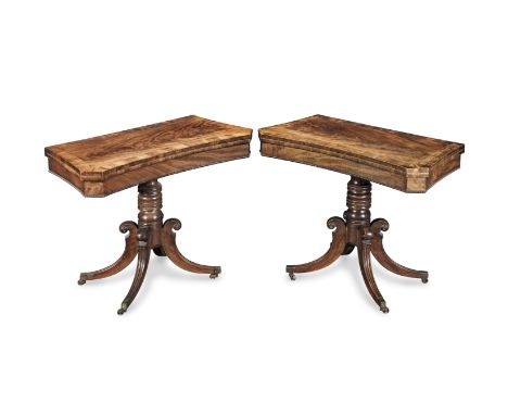 A pair of George IV mahogany concave-front card tablesCirca 1825Each with a shaped, flame veneered and crossbanded swivel hin