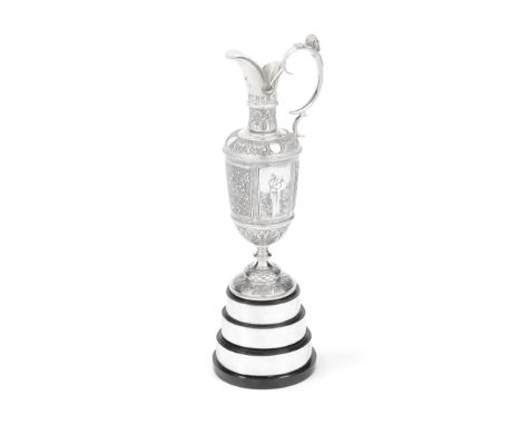 A silver replica of the Open Championship golf trophy ewerGarrard &amp; Co Ltd, London 1985Profuse chased decoration, elongat