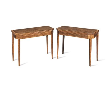 A pair of late George III rosewood and crossbanded card tablesCirca 1800Each with line-inlay and stringing, with canted front