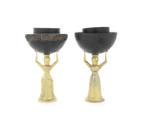 A pair of Greek silver, silver-gilt and patinated figural seven-light candelabrastamped 925, X and E50, circa 1969The stylise