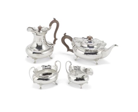 A silver four-piece tea and coffee service,  with fitted box on standHamilton &amp; Co of Calcutta, Chester 1912 / 1913Plain 