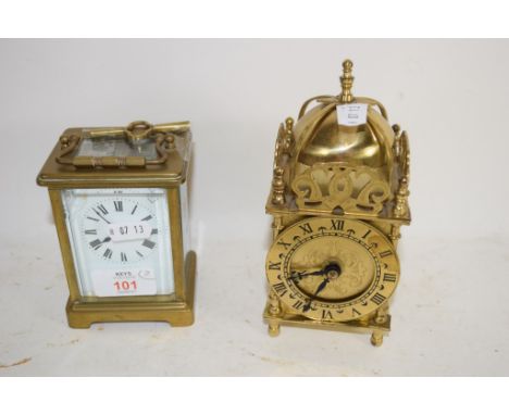 TWO CLOCKS, CARRIAGE CLOCK AND A FURTHER SKELETON LANTERN CLOCK