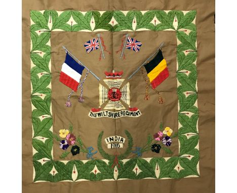 A WILTSHIRE REGIMENT NEEDLEWORK PANEL. The panel with a central Wiltshire Regiment crest beneath flags of France, Belgium and