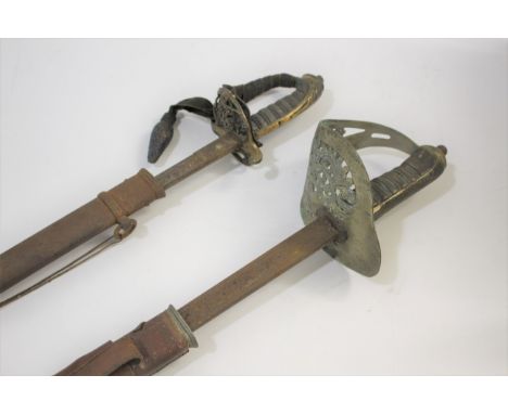 TWO SWORDS &amp; SCABBARDS including a 1845/54 pattern ceremonial sword, with fish skin grip, original leather lining to hand