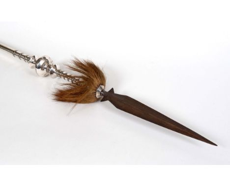 MALAY CEREMONIAL SPEAR with a silver wrapped shaft with ring turned decoration, mounted with a spear point and hair. 175cms l