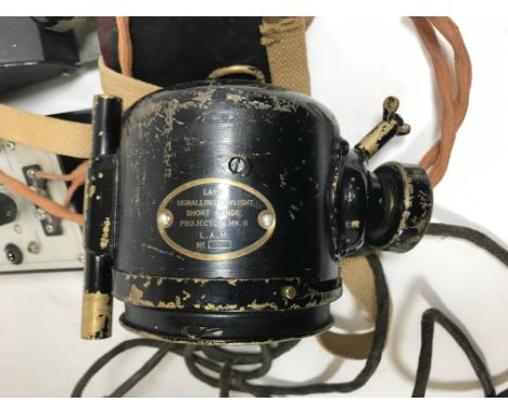 A MILITARY SIGNALLING LAMP AND MORSE KEY. A Second World War or later 'Lamp, signalling daylight short range projector MkII' 