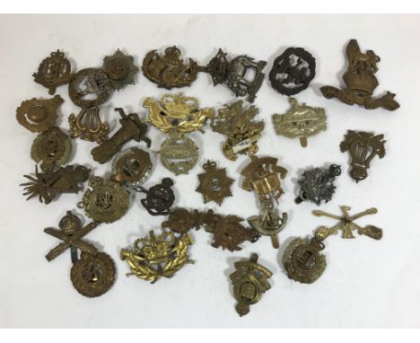 REGIMENTAL MILITARY CAP BADGES. A collection of assorted military cap badges to include examples for the 19th Hussars, 11th H