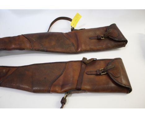 TWO LEATHER GUN SLIP CASES 2 good quality gun slip cases made in Reindeer skin, with leather straps and with a brass ring at 