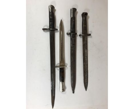 A COLLECTION OF FOUR BAYONETS, FIRST WORLD WAR AND LATER. Four bayonets, the first in scabbard, the blade stamped CSZ P. 44.5