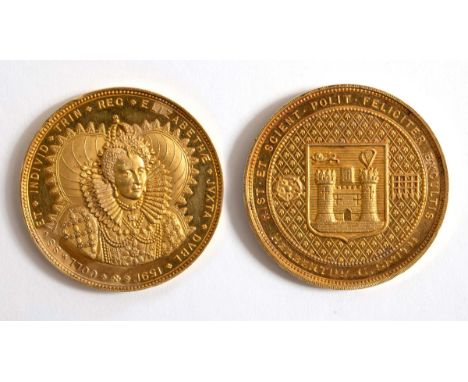 A TRINITY COLLEGE PRIZE MEDAL. A Trinity College, Dublin award to Herbertus G.Smith, with a portrait of Queen Elizabeth to th