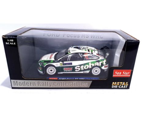 Sun Star, a boxed 1:18 scale "Modern Rally Collectibles" 3916 Ford Focus RS WRC "M.Wilson/M.Orr" Wales Rally GB 2006. Conditi
