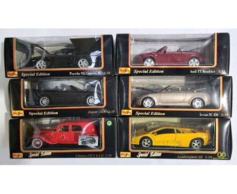 Maisto, a boxed 1:18 scale group to include Audi TT Roadster, Jaguar XKR and others. Although unchecked for completeness cond