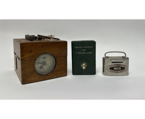 An Edward Wilkinson of Pocklington oak cased pigeon racing clock complete with turning key and metal handle to top, together 