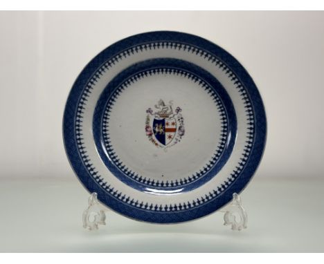 A Mid-18thc Chinese blue and white export armorial plate, with lion and crown to top with crest bellow enclosed within a flor