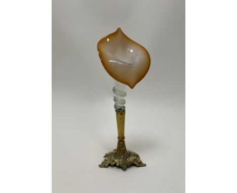 An Art Nouveau style epergne finished with a vaseline glass tulip-shaped bowl and mounted on a gilt metal stem with foliate d