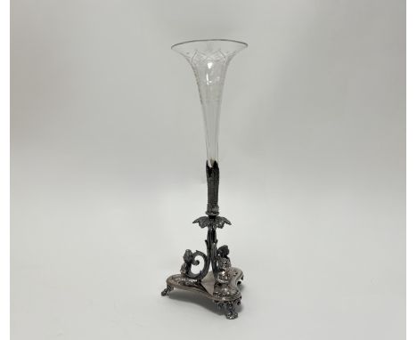 A decorative epergne complete with a clear etched glass trumpet vase set into a Sheffield plated base with addition of cherub