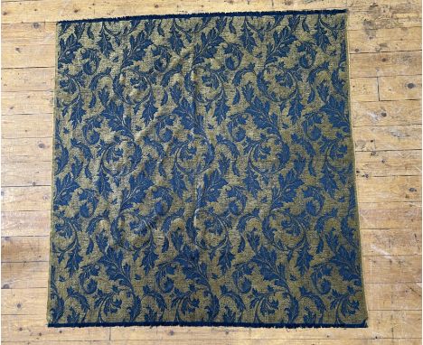 A blue and gold thread damask throw/tablecloth decorated with blue leaves and foliate and finished with a blue fringe border 