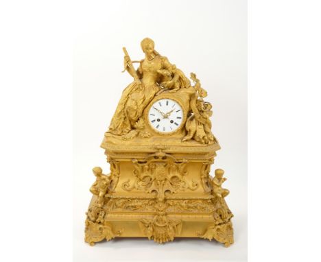 An impressive nineteenth century French ormolu mantel clock with enamel dial, seated huntress with crossbow, dog and dead gam