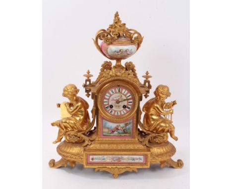 19th century French ormolu and porcelain mantle clock with painted cherub and romantic figure decoration, urn surmount, two p