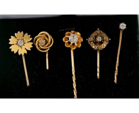 Five Victorian diamond set stick pins, one with a single old cut diamond estimated to weigh approximately 0.30cts.Condition r