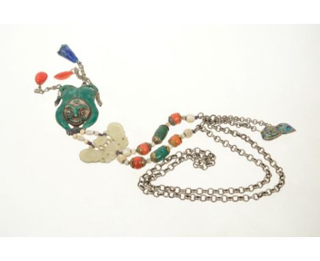 Antique Chinese necklace with a green enamelled stylized frog suspended from a carved jade/hardstone plaque with coral, mothe