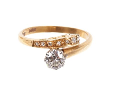 Diamond single stone ring with a brilliant cut diamond estimated to weigh approximately 0.40cts, in a crossover setting on 18