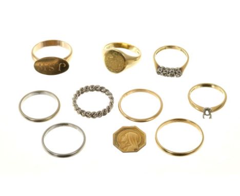 Nine gold rings various together a gold charmCondition report: 18ct gold signet ring, size N. Weights approximately 8.8 grams