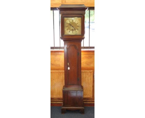 Late 18th longcase clock with single weight, chain thirty hour movement, twelve inch square brass dial with floral engraved d