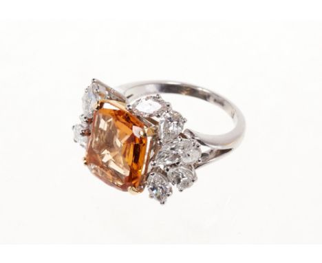 Topaz and diamond cluster cocktail ring with a rectangular facet cut topaz measuring approximately 11.5mm x10.5mm x 3.7mm, ob