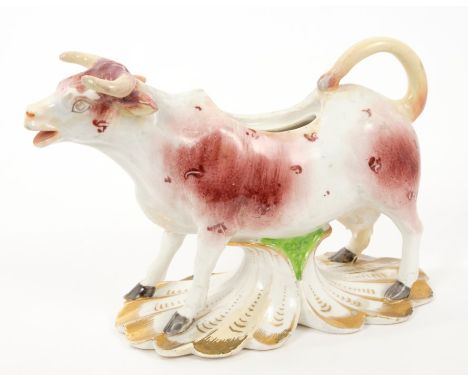 Early 19th century Bloor Derby cow creamer with brown patch decoration and fluted splayed base-red painted mark (lid Lacking)