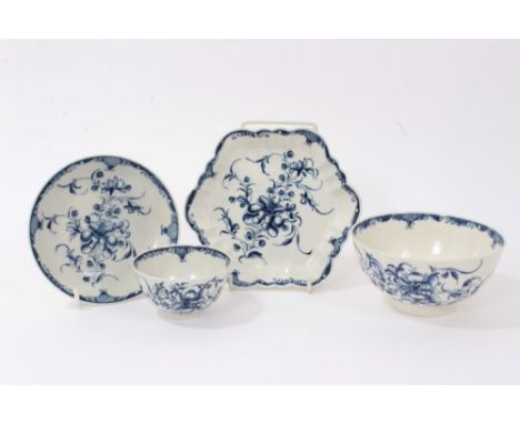 18th century Worcester blue and white teapot stand with printed floral sprays, matching sugar bowl, tea bowl and saucer (4)