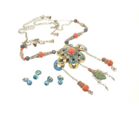 Antique Chinese necklace with enamelled plaque suspending turquoise and coral bead drops, on a white metal chain with lapis l