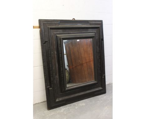 Impressive 17th century style Dutch ebonised ripple moulded wall mirror, of monumental scale, the rectangular plate within br