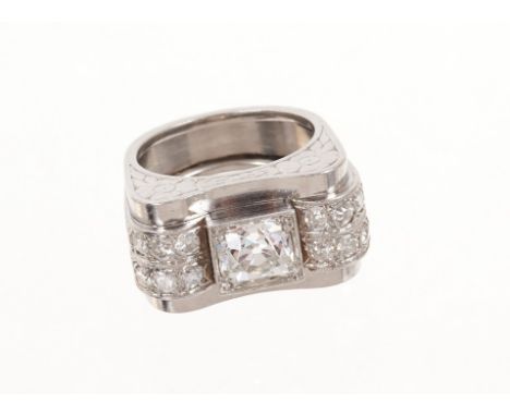 Art Deco diamond ring, the central old cut diamond estimated to weigh approximately 1.10cts, in an Odeonesque style setting w