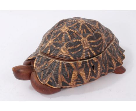 Tortoise carapace caddy box, hinged top enclosing a specimen wood inlaid interior and lidded compartment, with carved wooden 
