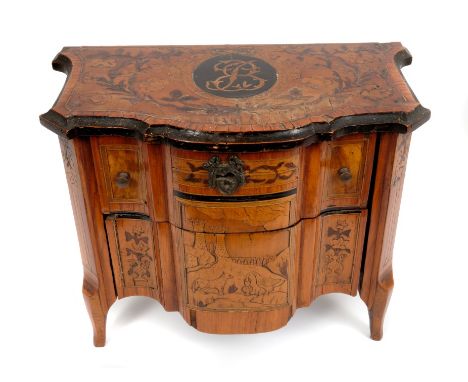 Late 18th century Continental marquetry inlaid miniature commode, of arc-en-arbalete form, the top centred by initialled oval