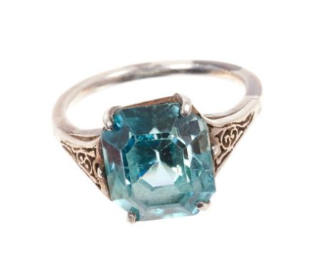 Art Deco blue zircon single stone ring with an octagonal step cut blue zircon measuring approximately 12.35mm x 10.40mm x 7.7