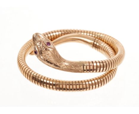 9ct gold snake bangle with a steel sprung coiled gold body and engraved gold head and tail.Condition report: Very good condit