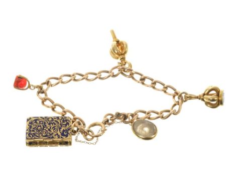 Victorian gold charm bracelet with a collection of five charms to include a Victorian gold and blue enamel vinaigrette/mourni