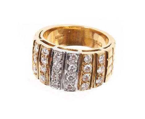 White and yellow gold ring, the wide band with rows of 22 brilliant cut diamonds in white and yellow gold setting. Estimated 