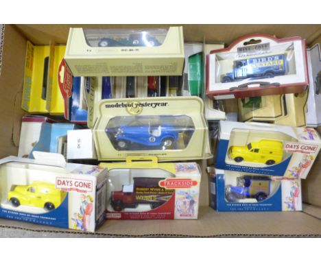 A box of approximately 20 Matchbox and Lledo Days Gone model vehicles 
