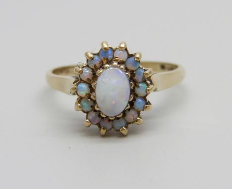 A 9ct gold and opal cluster ring, 2.1g, L/M