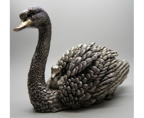 A silver covered model of a swan with signet, hallmarked and stamped 'filled', 15 x 10cm