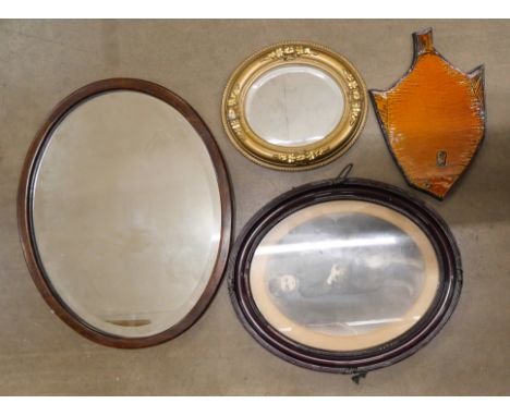 An oval picture frame and oval mirror and four boxes of assorted items, Kodak Retinette camera, coloured glass, penknives, ba