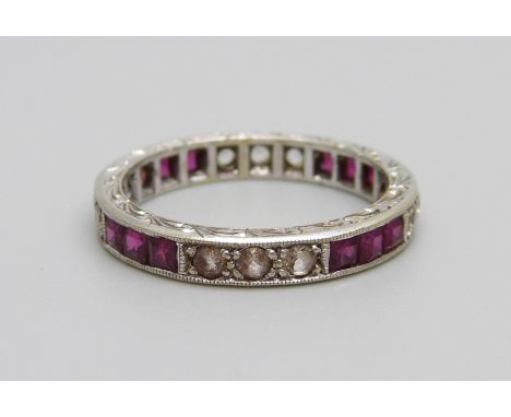A white metal, ruby &amp; white spinel set ring, marked 9ct, 2.7g, N/O