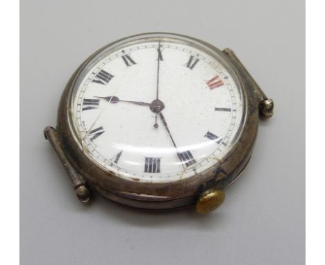A silver cased Longines trench watch, enamel dial with Roman numerals, red XII, movement marked Longines 15 jewels, swivel lu