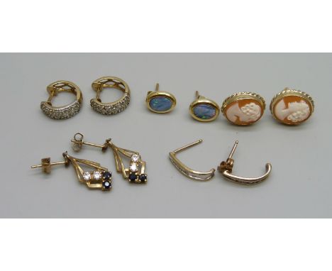 Three pairs of 9ct gold earrings, a pair of 14ct gold and opal earrings and a pair of yellow metal earrings, total weight 8.9