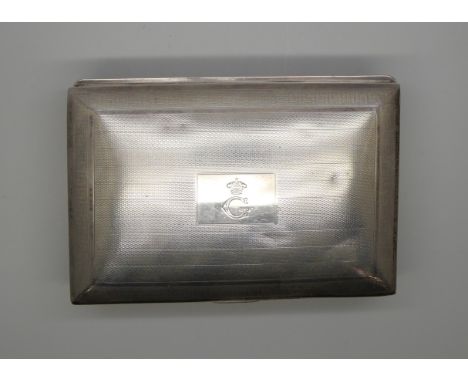 A silver cigarette box with engine turned design, Birmingham 1922, hinge a/f, 13 x 8.5cm
