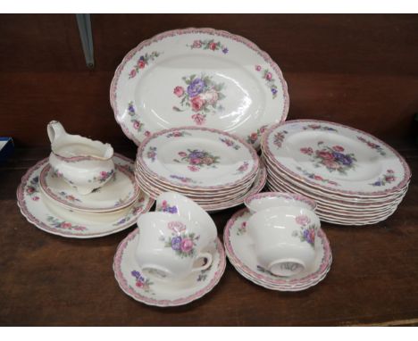 Clarice Cliff Royal Staffordshire Nancy pattern tea and dinnerwares, decorated with bouquest of flowers; ten dinner plates, f